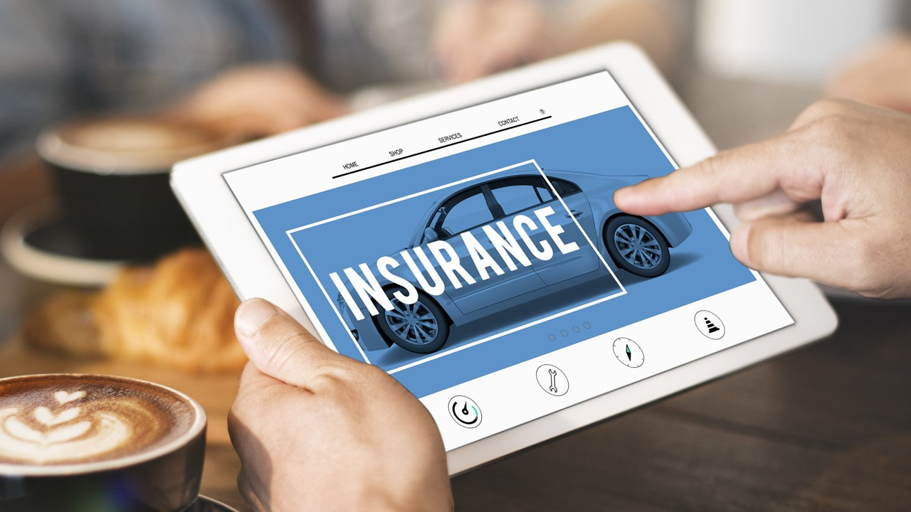 image of someone shopping car insurance in Lake Charles Louisiana on a tablet - Kelly Lee Insurance - Lake Charles LA